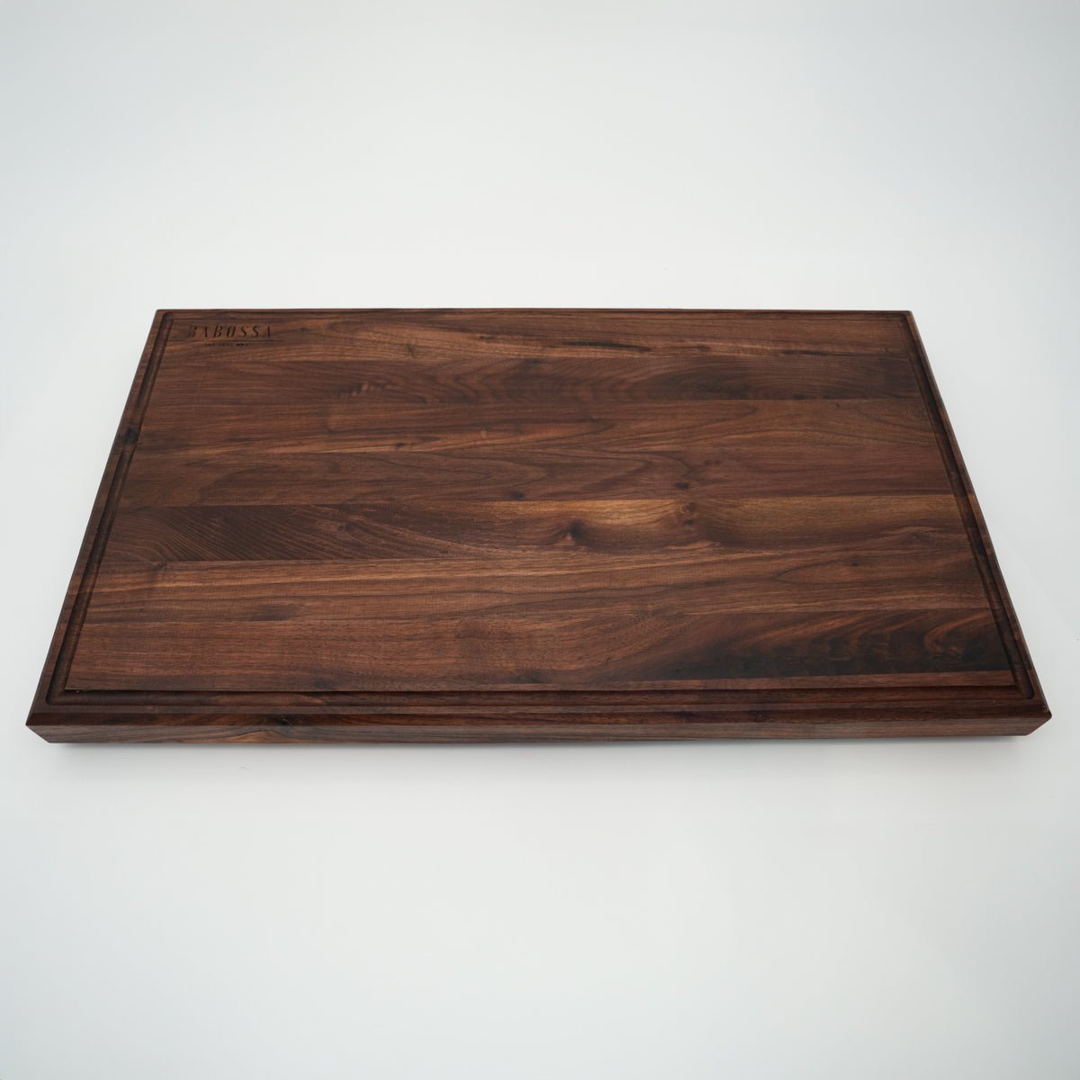 BABOSSA | Nussbaum Schneidebrett XL | Naturkante | Saftrille | 70x40x6 cm - BABOSSABABOSSA | Nussbaum Schneidebrett XL | Naturkante | Saftrille | 70x40x6 cmHolzbrettBABOSSABABOSSA