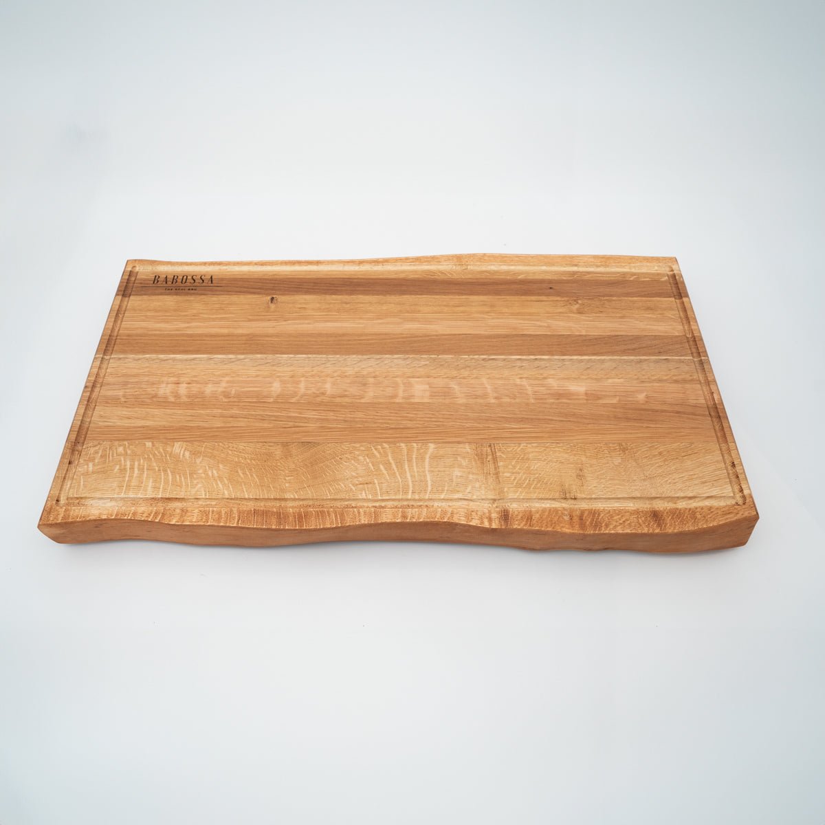 BABOSSA | Eichen Schneidebrett XL | Naturkante | Saftrille | 70x40x6 cm - BABOSSABABOSSA | Eichen Schneidebrett XL | Naturkante | Saftrille | 70x40x6 cmHolzbrettBABOSSABABOSSA